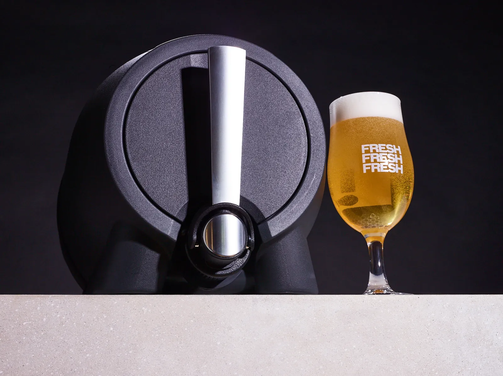 Pinter countertop system on a kitchen worktop, pint glass being poured, condensation visible